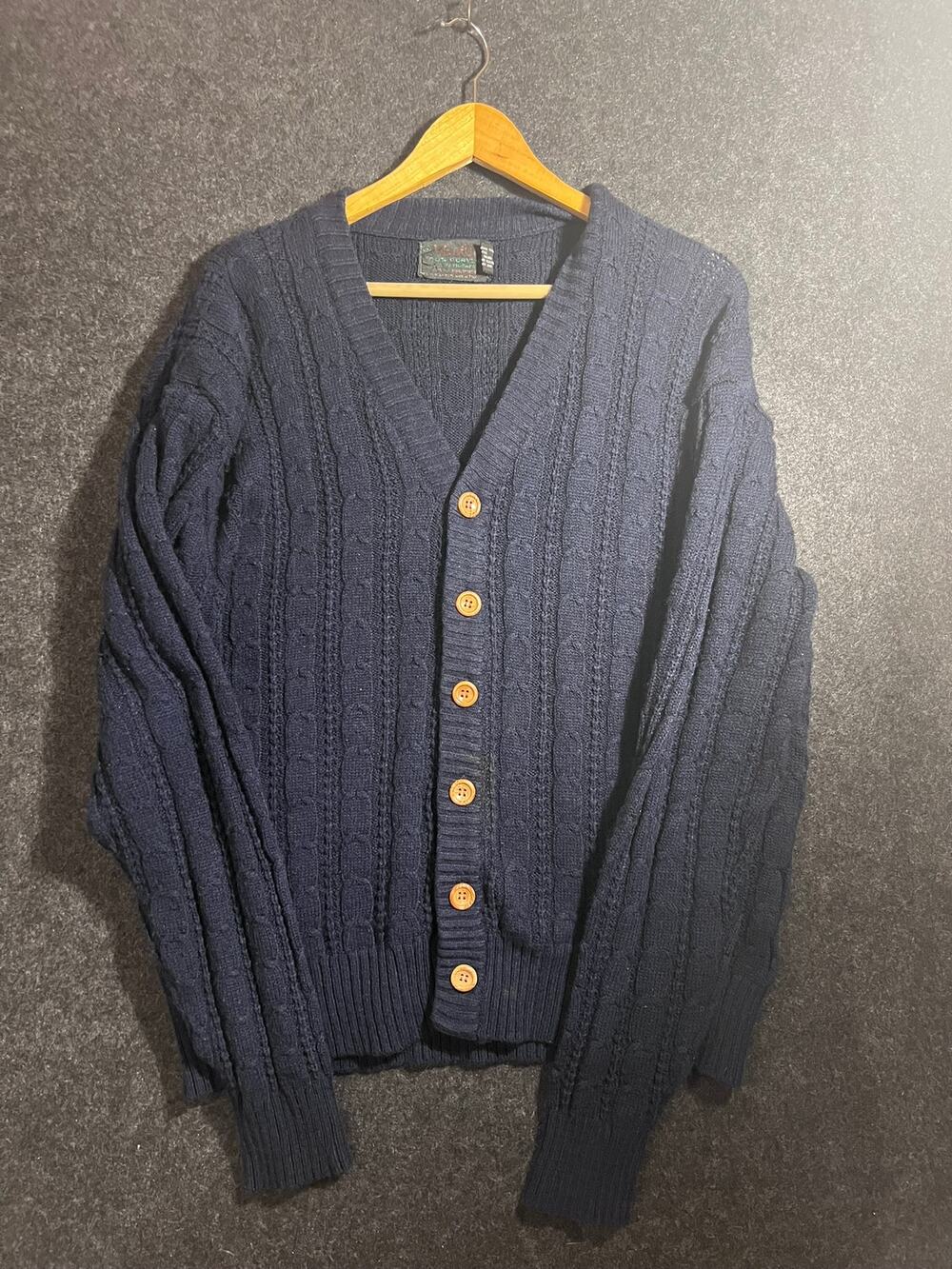 Navy blue cable knit cardigan with wooden buttons